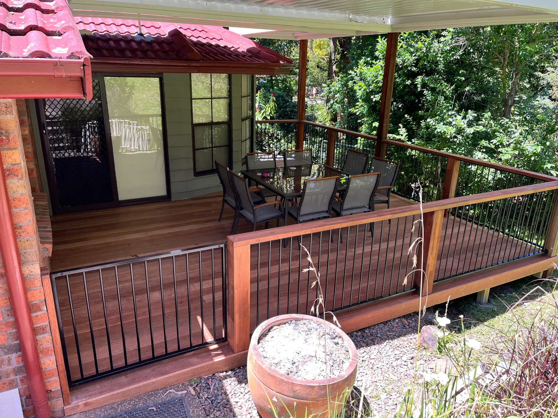 Custom elevated timber deck with a dining area built in Newcastle