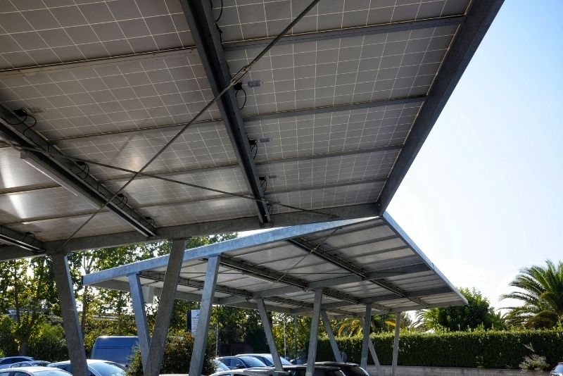 Newcastle carports providing sheds for several parked cars