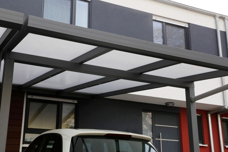 a carport installed in a building for car protection